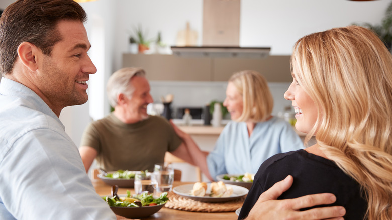 couple having dinner with parents