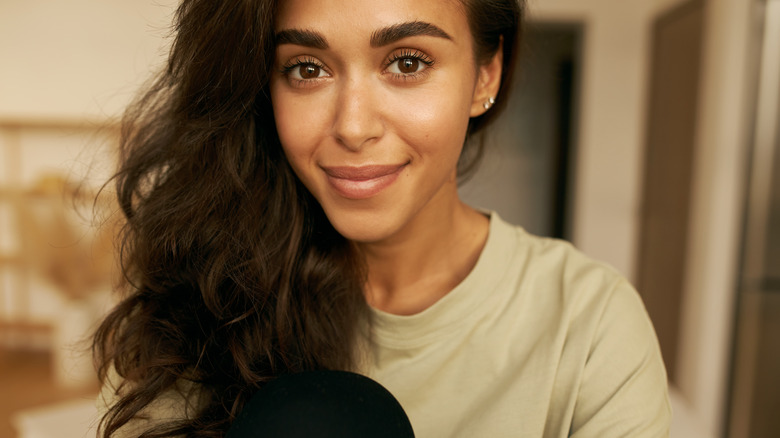 Woman with curled hair