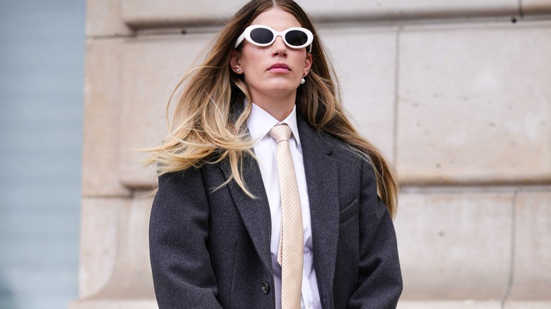 Woman wearing a tie