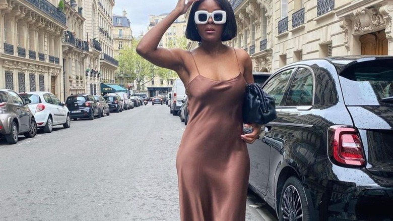Woman wearing brown slip dress