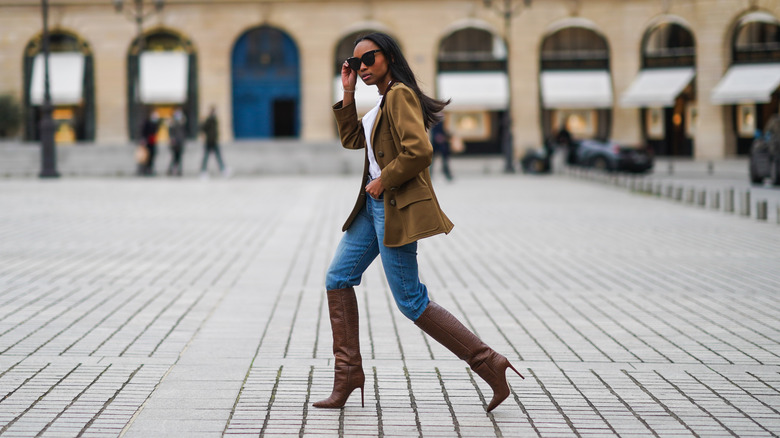 Emilie Joseph wearing stiletto boots