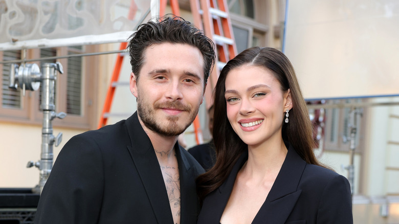 Brooklyn Peltz Beckham and Nicola Peltz Beckham posing for a photo at Vogue World: Hollywood 2025 at Paramount Studios