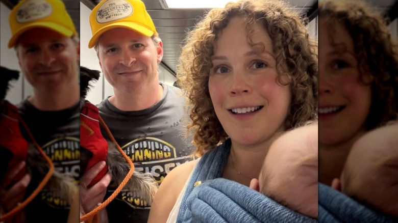 Erin Krakow and husband Ben Rosenbaum are pictured in an airport while carrying their dog and their newborn baby