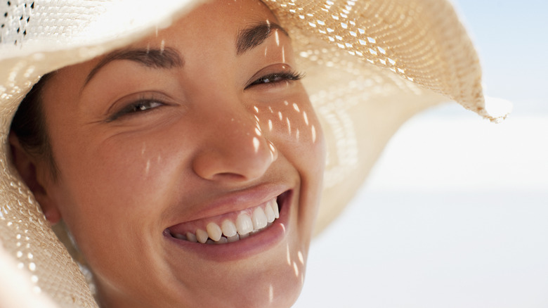 Woman smiling in the sun