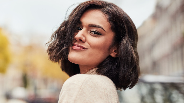 Woman with bob haircut smiling