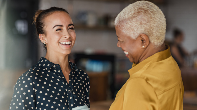 Two women talking