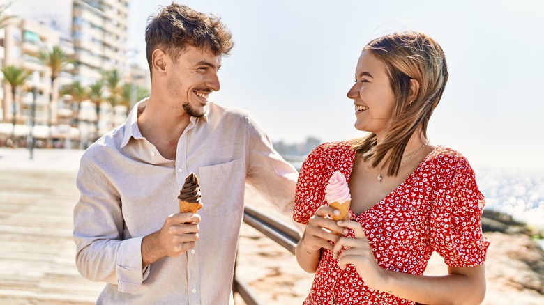 Man and woman eating ice crema