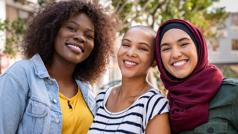 Three smiling women