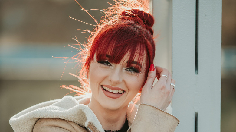 Woman touching her hair