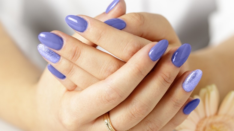 Perfectly manicure purple fingernails