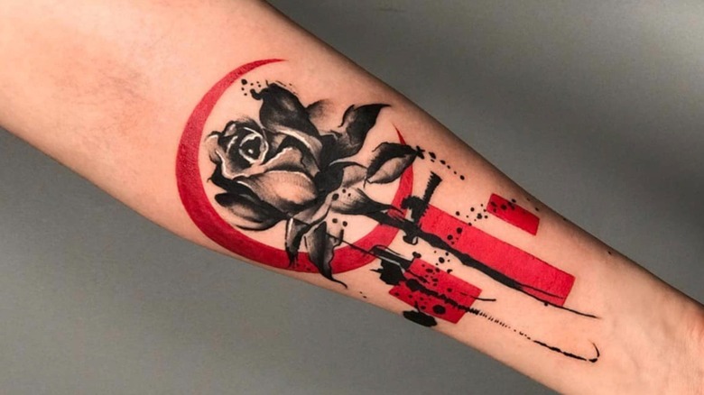 Trash polka tattoo with rose