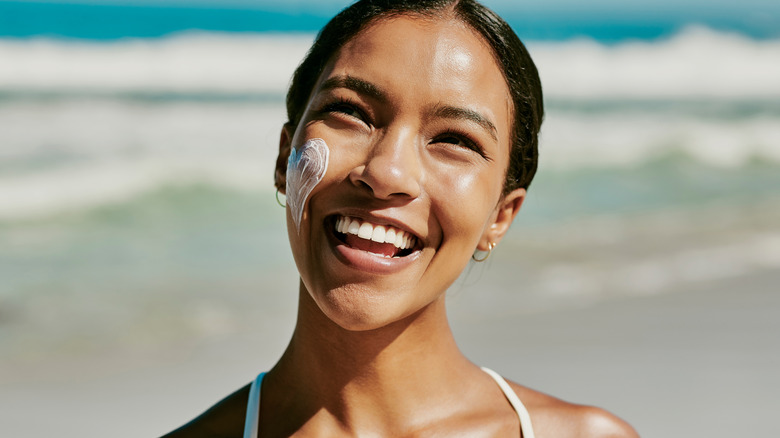 Woman wearing sunscreen