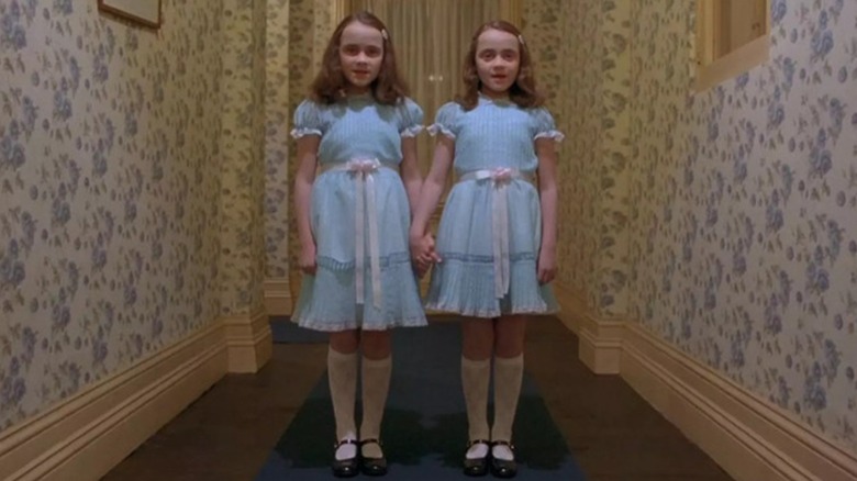 Louise and Lisa Burns and their characters the Grady twins in the movie 