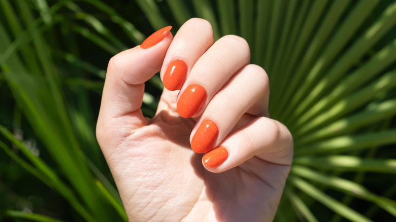 Orange short manicure
