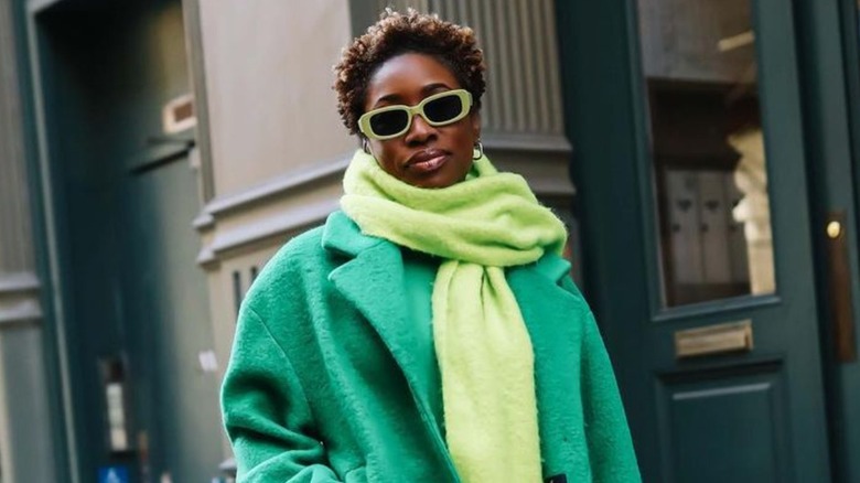 Woman wearing green coat
