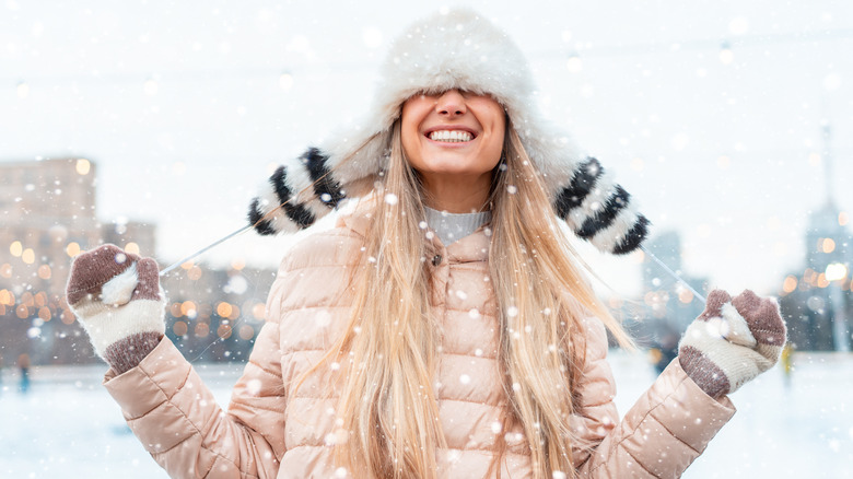 woman wearing fluffy hat