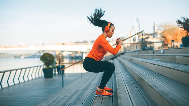 person jumping while exercising