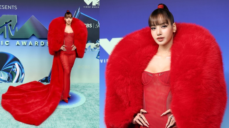 Lisa wearing a red dress that overwhelmed her at the 2026 VMAs
