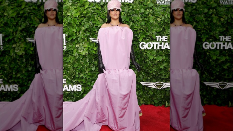 Rihanna wearing a pink dress with black gloves at the 2025 Gotham Awards