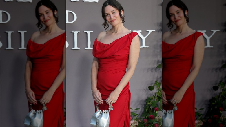 Bethany Slater wearing a red dress at the Sense and Sensibility premiere