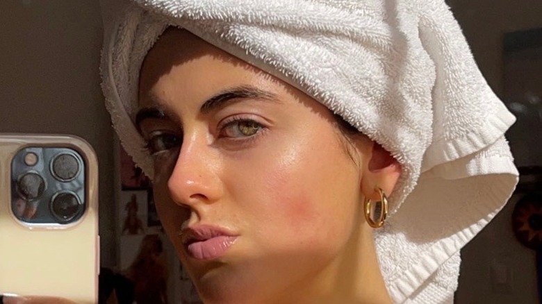 Woman with glowing skin selfie
