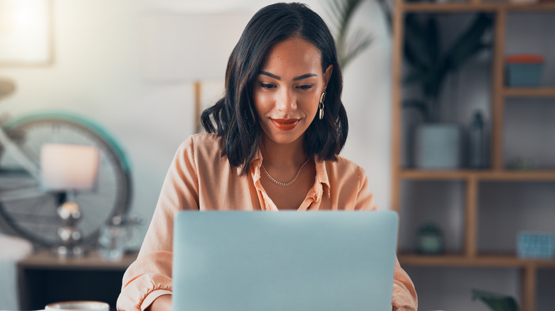 Woman working on laptop