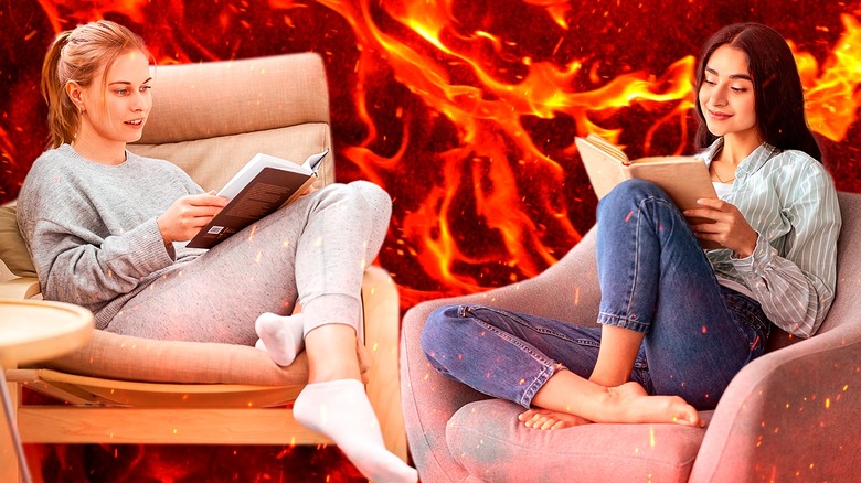 Two women reading spicy books