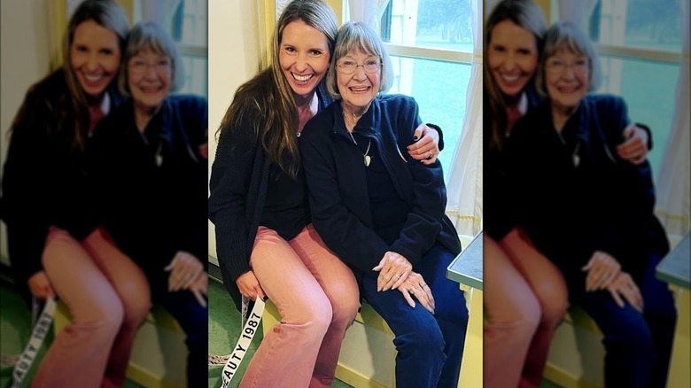 Wendi Lou Turnbaugh and Charlotte Stewart sitting together and smiling