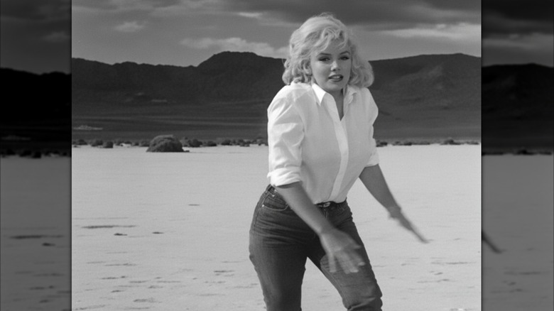 Marilyn Monroe wearing white top and jeans in "The Misfits."