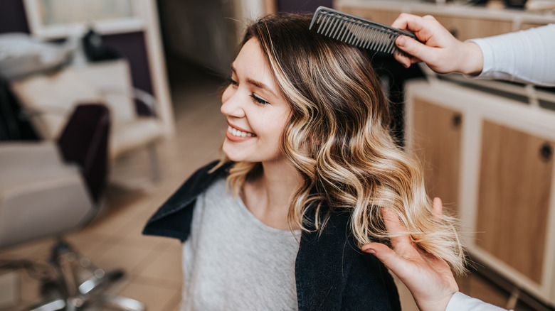 woman getting her hair done