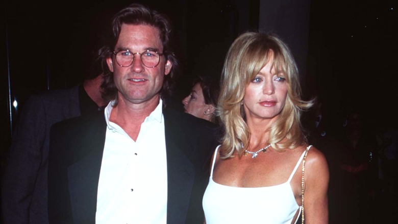 Closeup of Goldie Hawn and Kurt Russell on the red carpet in 1996