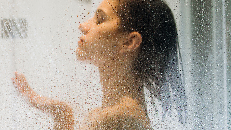 A woman taking a shower 