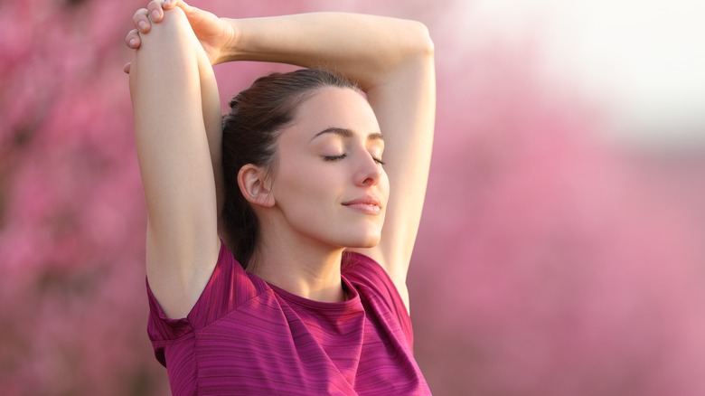 Woman stretching outside