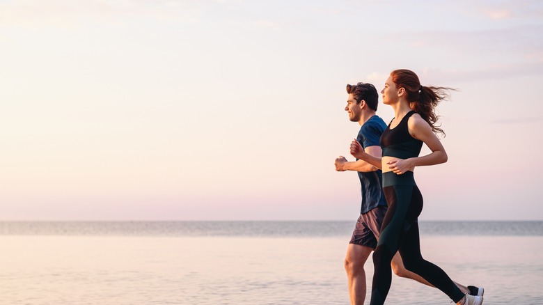 Man and woman running