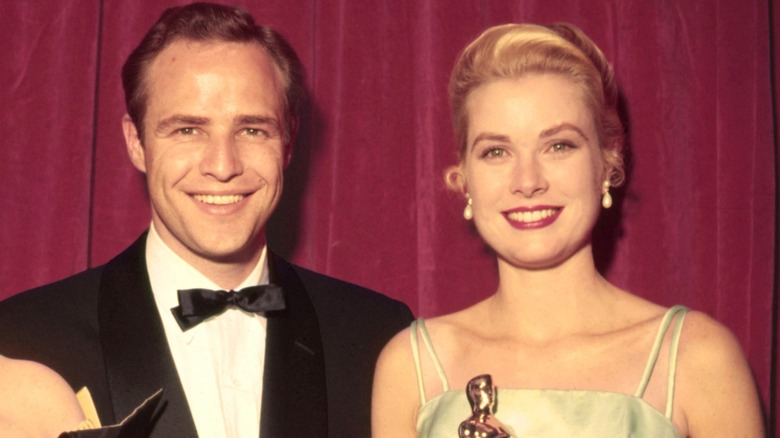 Grace Kelly and Marlon Brando at the 1955 Oscars.