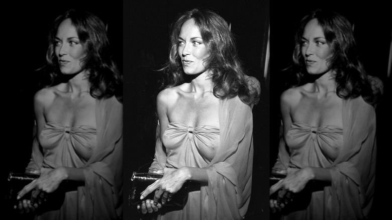 A B&W photo of Catherine Bach wearing a strapless dress and a sheer shawl