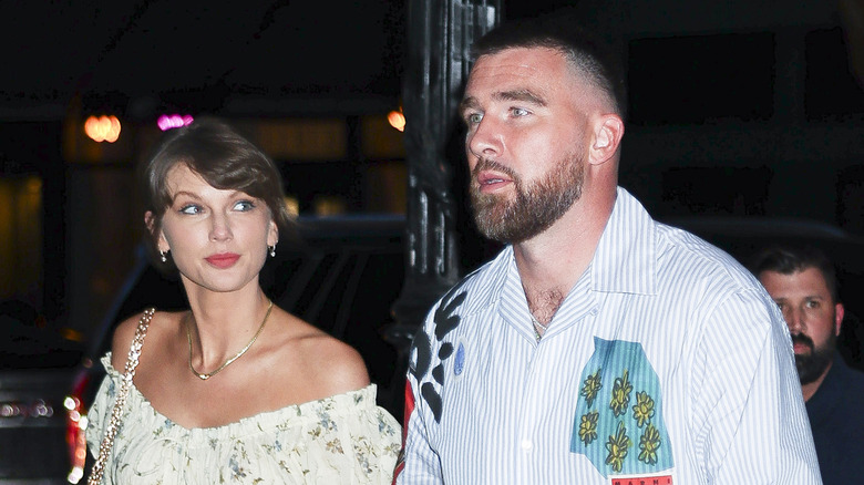 Taylor Swift and Travis Kelce walking together