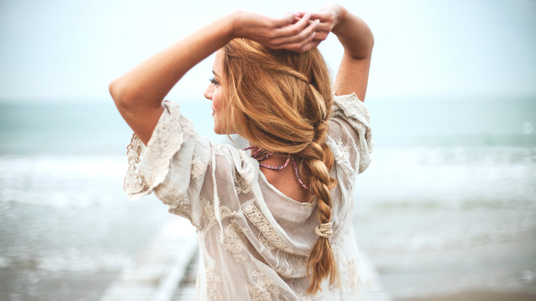 Woman with braid at beach