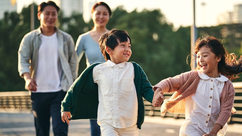 a young Asian family