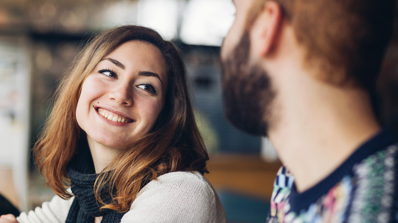 woman smiling at man