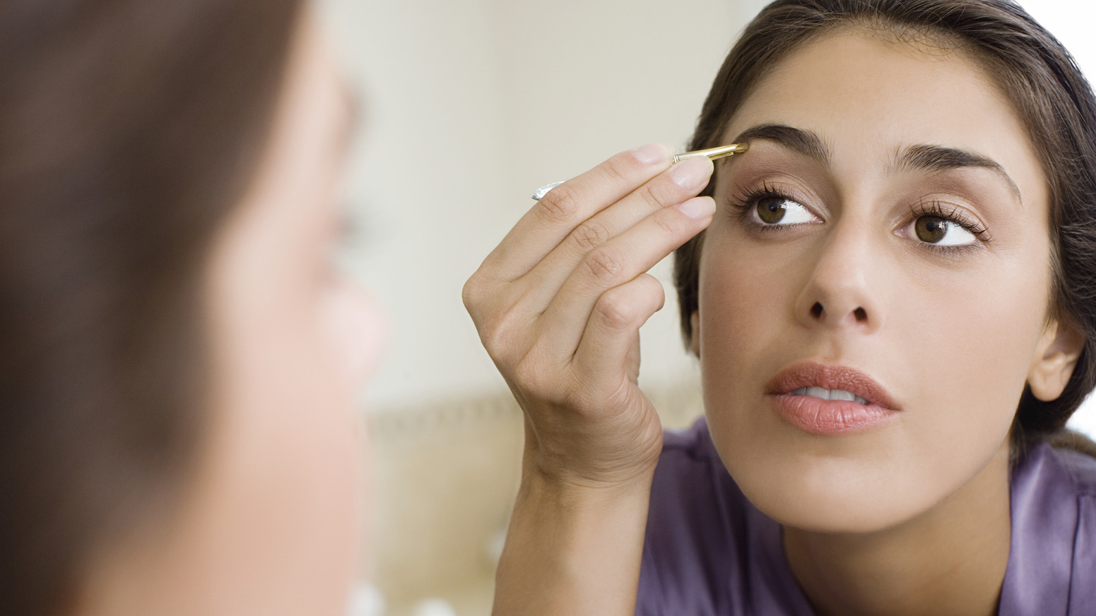 TikTok's Viral Eyebrow Filter Has People Completely Changing Their Look