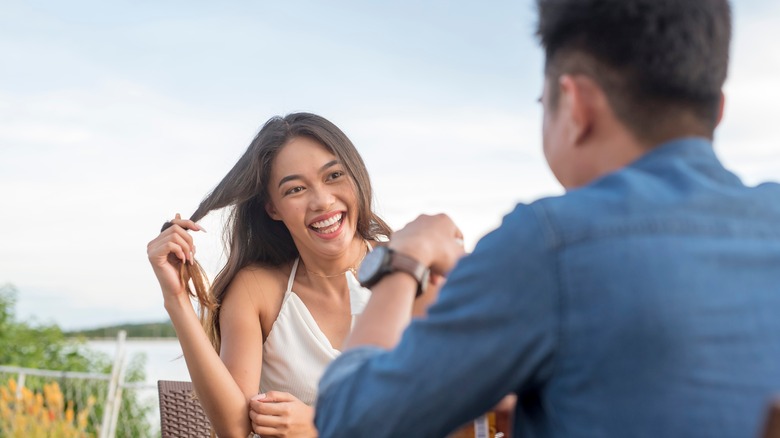 Woman smiling on date