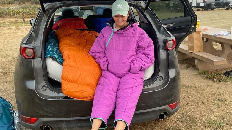 woman sitting in a car