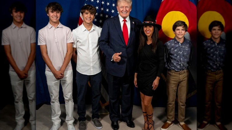 Lauren Boebert poses with her sons and the president