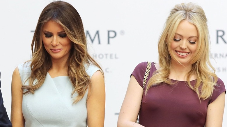 Tiffany and Melania Trump cutting a ribbon