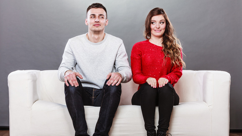 awkward couple on couch 