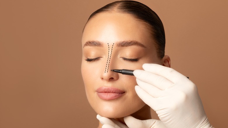 woman getting nose job