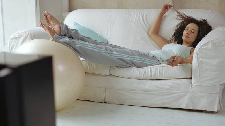 woman relaxing on couch