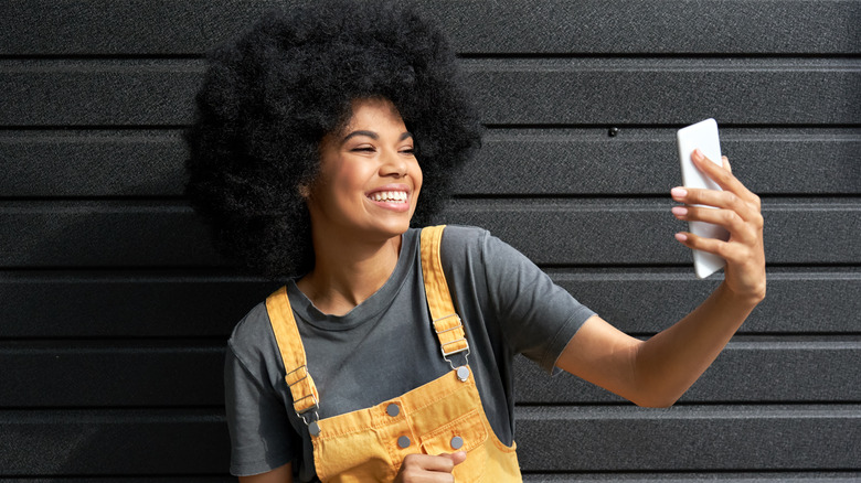 woman taking selfie