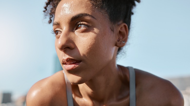 woman with face sweat